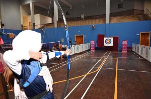 Students participate in table tennis trials during the “Khelta Punjab Pink Games Trials” held at the sports gymnasium.