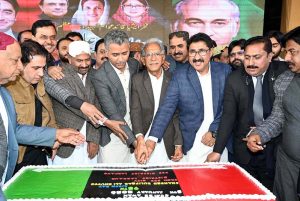 Special Assistant to Chief Minister Sindh, Khair Muhammad Sheikh and General Secretary PPP Larkana and others cutting the cake of 98th birth day anniversary of Shaheed Zulfiqar Ali Bhutto at Arts Council