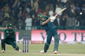 Australian batter xavier Bartlett playing shot during the first Twenty20 International Cricket match between Pakistan and Australia at the Gaddafi Cricket Stadium.