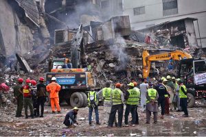 Firefighters douse water to extinguish fire at Gul Plaza.