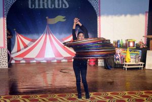 Artist performs on stage during a cultural festival at the Sargodha Arts Council.