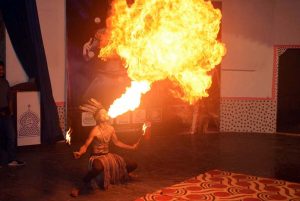 Artist performs on stage during a cultural festival at the Sargodha Arts Council.