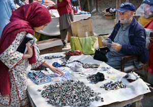 A girl busy in shopping at I-9 weekly bazaar in the Federal Capital.