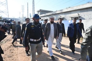 Minister for Religious Affairs and Interfaith Harmony, Sardar Muhammad Yousuf arrives to attend funeral prayers of victims following the suicide bombing at a religious site on the outskirts of the federal capital. Thousands of mourners attended the mass funeral .