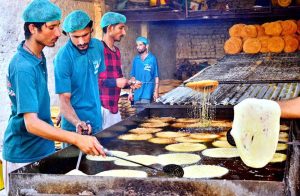 – Workers prepare Pheni, the traditional fried vermicelli sweet, as demand surges for sehri items ahead of the holy month of Ramazan.