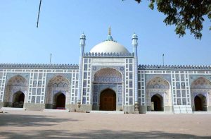 A majestic view of the historic Shahi Eidgah Mosque, constructed in 1735 during the Mughal era by Nawab Abdul Samad Khan, then Governor of Multan. Adorned with seven domes, intricate blue tile work, and grand architecture, the mosque stands as a timeless symbol of the city’s rich heritage and spiritual legacy.