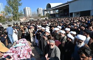 A large number of people attend funeral prayers at Imambargah Al-Sadiq in Sector G-9/2 for the victims of the suicide attack on Imambargah Khadijat-ul-Kubra in Tarlai Kalan.