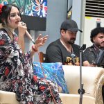 A student performs on stage during the Singing Competition (Folk & Ghazal) at Islamabad Model College for Girls (PG), G-10/4.
