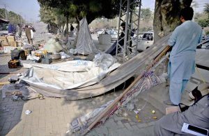A man is busy setting up a stall on Line at Murree Road in Shamsabad as a Ramazan Bazaar has been set up to facilitate customers ahead of the holy month of Ramazan.