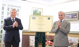 Prime Minister Muhammad Shehbaz Sharif and President of Uzbekistan Shavkat Mirziyoyev unveiling the memorial plaque of naming road in sector F-10 Islamabad as Tashkent Street during the official ceremony held at the Prime Minister's House.
