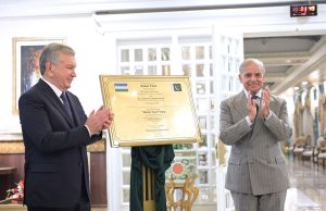 Prime Minister Muhammad Shehbaz Sharif and President of Uzbekistan Shavkat Mirziyoyev unveiling the memorial plaque of naming road in sector F-10 Islamabad as Tashkent Street during the official ceremony held at the Prime Minister's House.