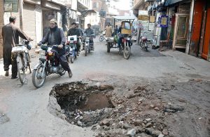 A huge dug-up pit on Temor Road at Loha Market poses a serious hazard to motorists and pedestrians, highlighting poor road maintenance and needs the attention of concerned authorities.