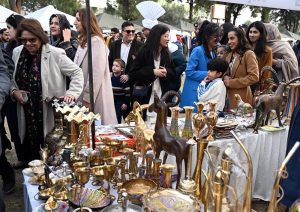 Visitors enjoy a double-decker bus ride during the two-day Pakistan Tourism, Sports & Family Festival at the Sports Complex in the Federal Capital
