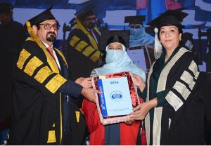 Federal Minister of State for Education and Professional Training Wajiha Qamar distributing doctorate degrees among students during the convocation ceremony at Bahauddin Zakariya University.