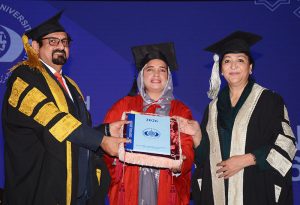 Federal Minister of State for Education and Professional Training Wajiha Qamar distributing doctorate degrees among students during the convocation ceremony at Bahauddin Zakariya University.