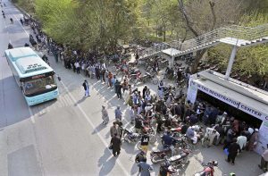 Motorcyclists stand in a long queue at Kachnar Park for mandatory M-Tag registration under the second phase of the capital’s vehicle tagging drive.