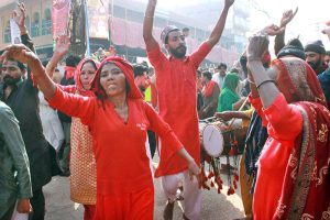 Devotees performing dhamal at the shrine of Lal Shahbaz Qalandar on last day of 774th Urs celebration