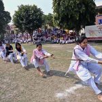 Students pull with all their force to win in the inter-collegiate tug-of-war organized by the Education Board at Government Degree College, Farooq Colony.