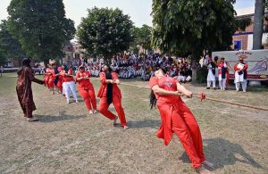 Students pull with all their force to win in the inter-collegiate tug-of-war organized by the Education Board at Government Degree College, Farooq Colony.