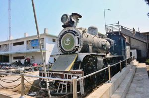 A view of a more than 100-year-old train engine installed by the Railway Department outside the railway station.