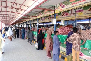 The Ramadan Bazaar is crowded with customers shopping for groceries at subsidized rates ahead of Iftar during the holy month of Ramzan.