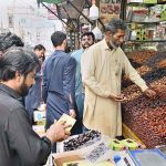 People busy purchasing dates at Baden Road amid rising demand for iftar ahead of the holy month of Ramazan.