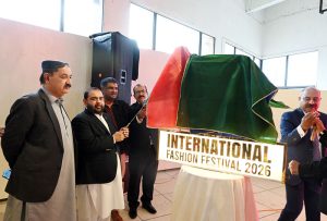 Aurangzeb Khan Khichi, Federal Minister for National Heritage and Culture Division, unveils the logo to inaugurate the International Fashion Festival 2026