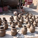 Worker busy preparing clay made stuff at his work place near Kumharpara