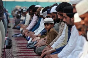 A security official stands on high alert at Eidgah Masjid during the second Namaz-e-Juma (Friday prayer) of the holy fasting month of Ramazan.