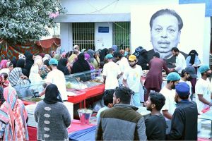 Volunteers distribute daily sehri and iftar meals to people during the holy month of Ramazan at Government Allama Iqbal Teaching Hospital.