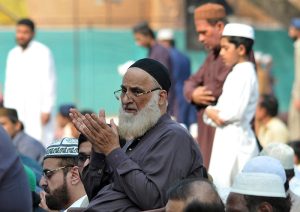 A security official stands on high alert at Eidgah Masjid during the second Namaz-e-Juma (Friday prayer) of the holy fasting month of Ramazan.