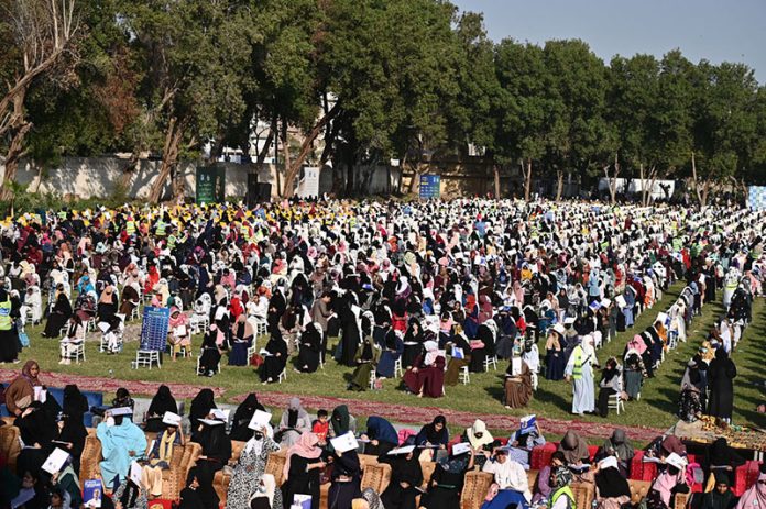 A large number of students solving question paper during pre-entry test organized by Al-Khidmat Foundation Pakistan at public school