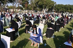 A large number of students solving question paper during pre-entry test organized by Al-Khidmat Foundation Pakistan at public school