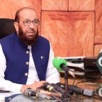 Federal Minister for Interfaith Harmony Sardar Muhammad Yousuf speaks to the media during a visit to Old Haji Camp.