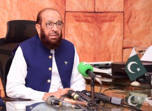 Federal Minister for Interfaith Harmony Sardar Muhammad Yousuf speaks to the media during a visit to Old Haji Camp.
