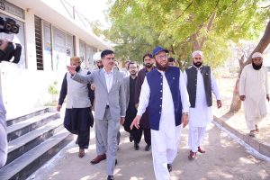 Federal Minister for Interfaith Harmony Sardar Muhammad Yousuf speaks to the media during a visit to Old Haji Camp.