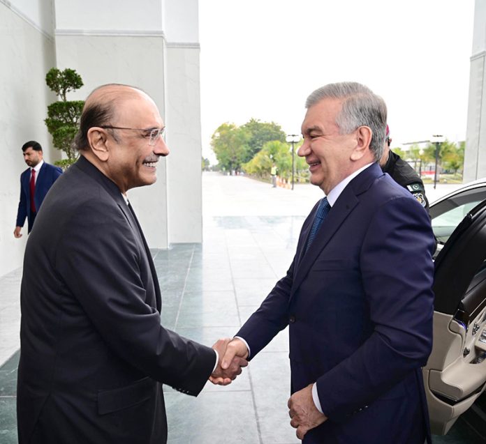 President Asif Ali Zardari receives the President of the Republic of Uzbekistan, Mirziyoyev Shavkat Miromonovich, upon his arrival at Aiwan-e-Sadr