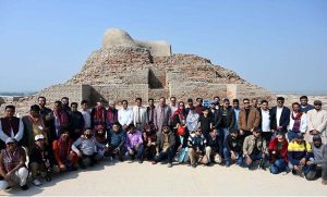 A group photo of the Mohen-Jo-Daro Safari Train delegation of the Sindh Tourism Department during their visit to the world-famous archaeological site of Moen-Jo-Daro