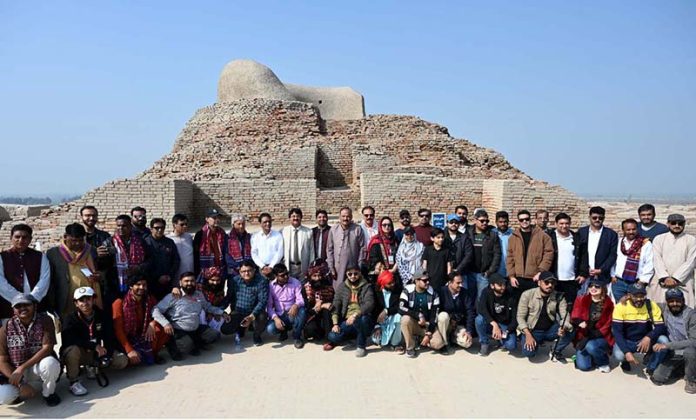 A group photo of the Mohen-Jo-Daro Safari Train delegation of the Sindh Tourism Department during their visit to the world-famous archaeological site of Moen-Jo-Daro