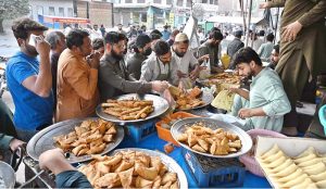 People busy purchasing food items for iftari during holy month of Ramazan.