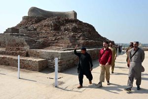 A group photo of the Mohen-Jo-Daro Safari Train delegation of the Sindh Tourism Department during their visit to the world-famous archaeological site of Moen-Jo-Daro