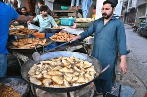 People busy purchasing food items for iftari during holy month of Ramazan.