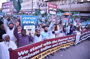 Activists of the Central Muslim League hold a rally in support of the Pakistan Army outside the Karachi Press Club.