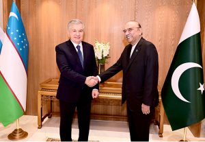 President Asif Ali Zardari shakes hands with the President of the Republic of Uzbekistan, Mirziyoyev Shavkat Miromonovich, at Aiwan-e-Sadr
