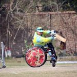 A batsman is clean bowled as the ball hits the stumps during the T-20 cricket match between Gilgit-Baltistan and Sindh Wheelchair Cricket teams in the 5th Interloop Quaid-e-Azam Trophy 2026, organized under the aegis of the Pakistan Wheelchair Cricket Council (PWCC) at Bohran Wali Ground.