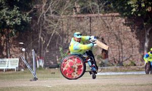 A batsman is clean bowled as the ball hits the stumps during the T-20 cricket match between Gilgit-Baltistan and Sindh Wheelchair Cricket teams in the 5th Interloop Quaid-e-Azam Trophy 2026, organized under the aegis of the Pakistan Wheelchair Cricket Council (PWCC) at Bohran Wali Ground.