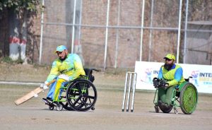 A batsman is clean bowled as the ball hits the stumps during the T-20 cricket match between Gilgit-Baltistan and Sindh Wheelchair Cricket teams in the 5th Interloop Quaid-e-Azam Trophy 2026, organized under the aegis of the Pakistan Wheelchair Cricket Council (PWCC) at Bohran Wali Ground.