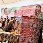Sindh Minister for local government Syed Nasir Hussain Shah addressing during Ceremony to distribute ownership certificates among slum dwellers at SRTC ground.