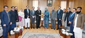 The Hon'ble Chief Justice of Pakistan, Mr. Yahya Afridi, presenting a souvenir to Ms. Syeda Tanzeela Sabahat, Secretary, Law and Justice Commission of Pakistan, on the completion of her one-year deputation as Secretary, Law and Justice Commission of Pakistan, at the Supreme Court of Pakistan.