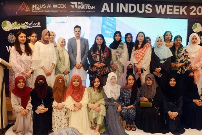 Federal Minister for Information Technology and Telecommunication Shaza Fatima Khawaja with Special Assistant to the Chief Minister Sindh for Science and Information Technology Department Government of Sindh, Mr. Ali Rashid in a group photo with students on the occasion of women hackathon under Indus AI Week 2026 at Zaitoon IT Park of Saylani Welfare International Trust